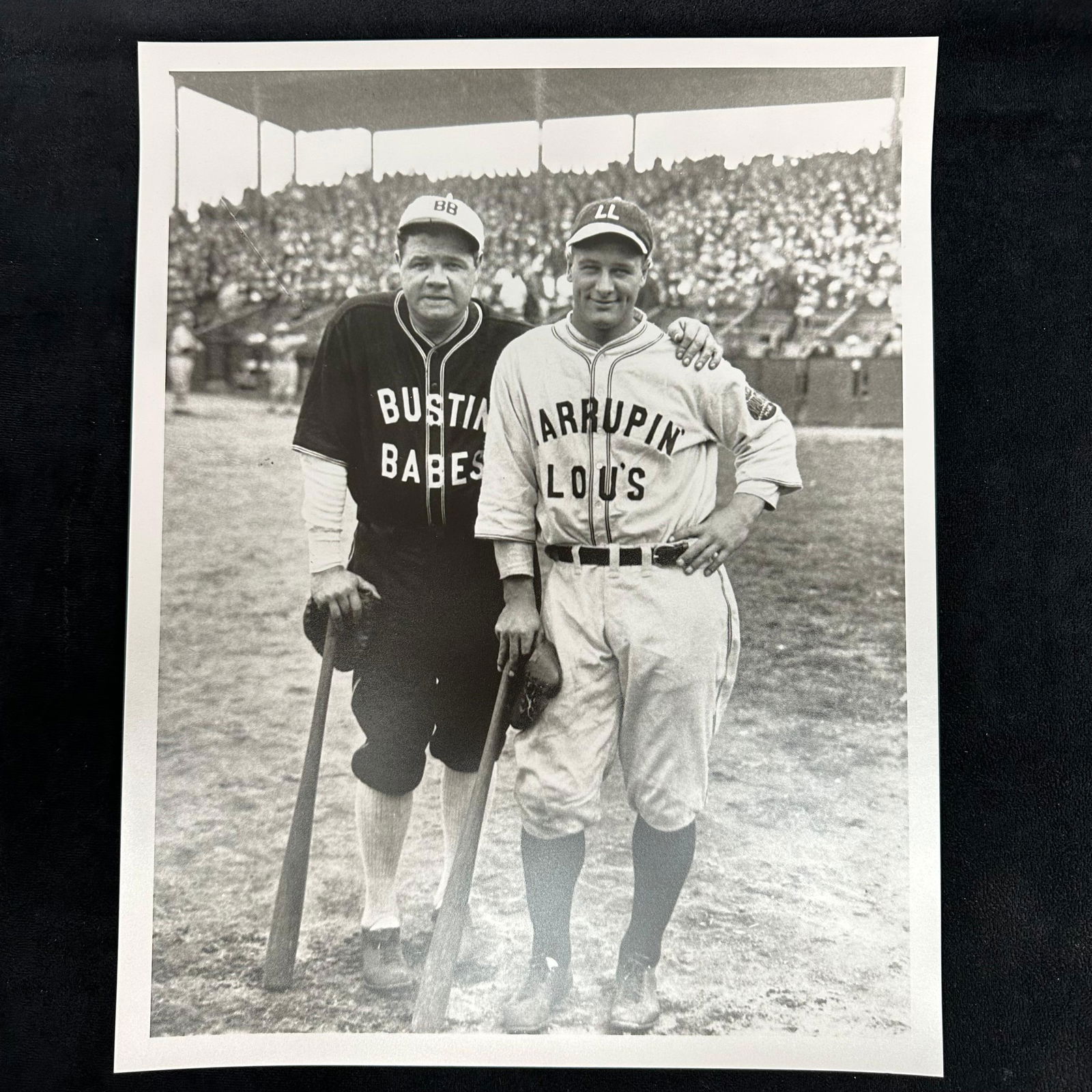 Analog Black and White Photograph Print Babe Ruth and Lou Gehrig Barnstorming Tour: Analog black and white photographic print featuring Babe Ruth and Lou Gehrig during their 1927 barnstorming tour. Ruth wears his “Bustin’ Babes” uniform, while Gehrig stands beside him in hi