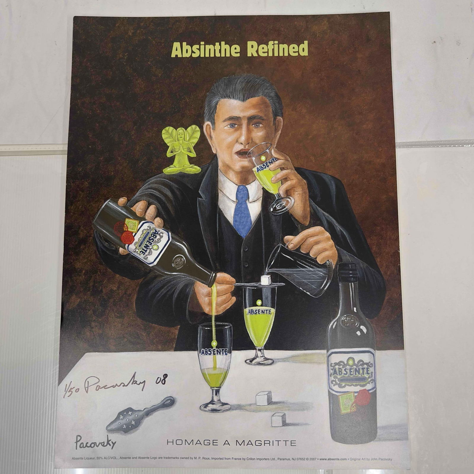 Absinthe Refined Ad Poster Homage A Magritte by John Pacovsky Hand Signed and Numbered 48: Absinthe Refined Ad Poster Homage A Magritte by John Pacovsky Hand Signed and Numbered 48. This set includes forty eight (48) hand signed and numbered posters by John Pacovsky. Limited Edition 50, fro