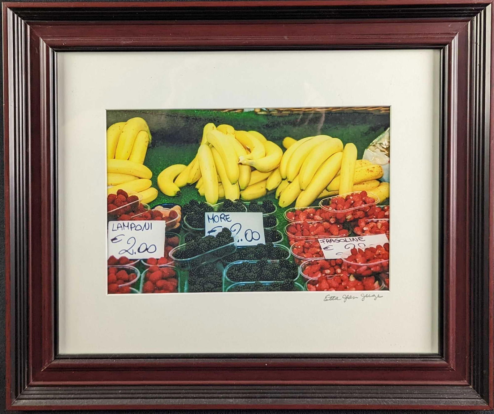 Framed Etta Jean Juge Fruit Stand Photo: Framed Etta Jean Juge "Fruit Stand" Photo. This is signed by the artist on the bottom right on the matting. The framed photo is approx 17" x 1" x 14" and it weighs 3lbs. The photo/