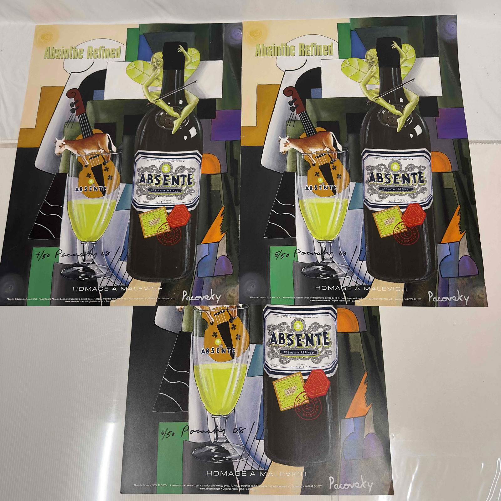 Absinthe Refined Ad Poster Homage A Malevich by John Pacovsky Hand Signed and Numbered: Absinthe Refined Ad Poster Homage A Malevich by John Pacovsky Hand Signed and Numbered. This set includes three (3) hand signed and numbered posters by John Pacovsky. Limited Edition 50, from 2008. A