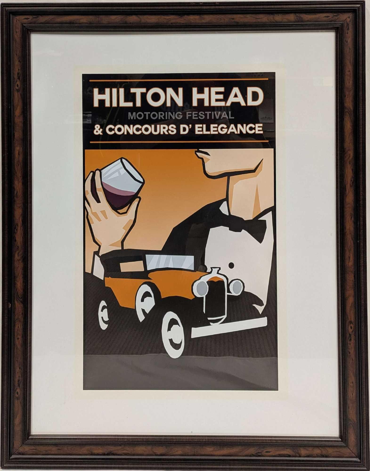 Framed 2015 Hilton Head Motoring Festival Poster: Framed 2015 Hilton Head Motoring Festival Poster. This framed poster is approx 25 1/2" x 1 1/4" x 31 1/2" and it weighs 6.70lbs. The frame corners have some chips. The year 2015 was written on the pos