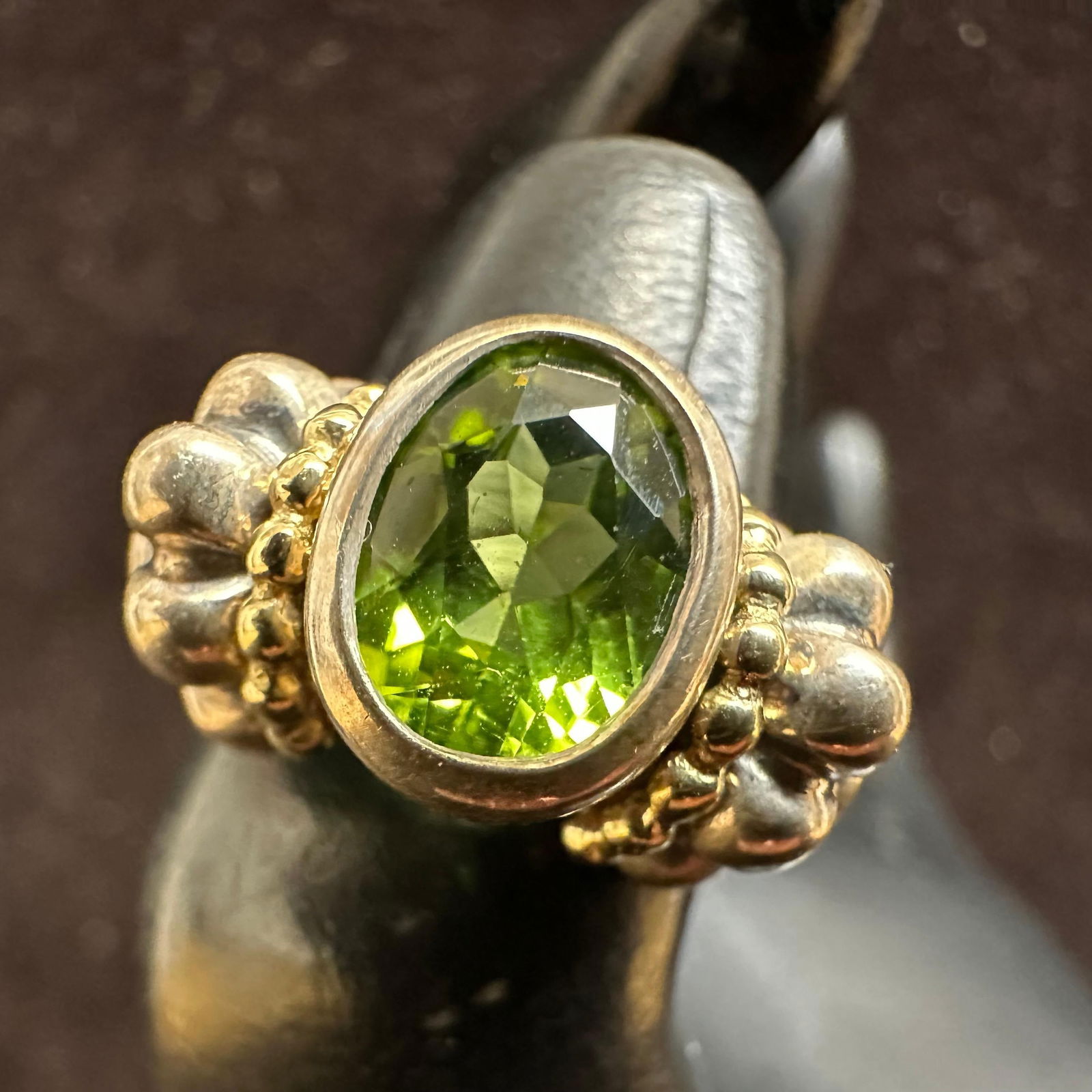 Peridot Sterling Silver and 18K Gold Caviar by Lagos Ring: This item is in good pre-owned, previously used/displayed condition with noticeable light wear and surface scratches. Please reference all photos for full details. This piece of jewelry has been teste