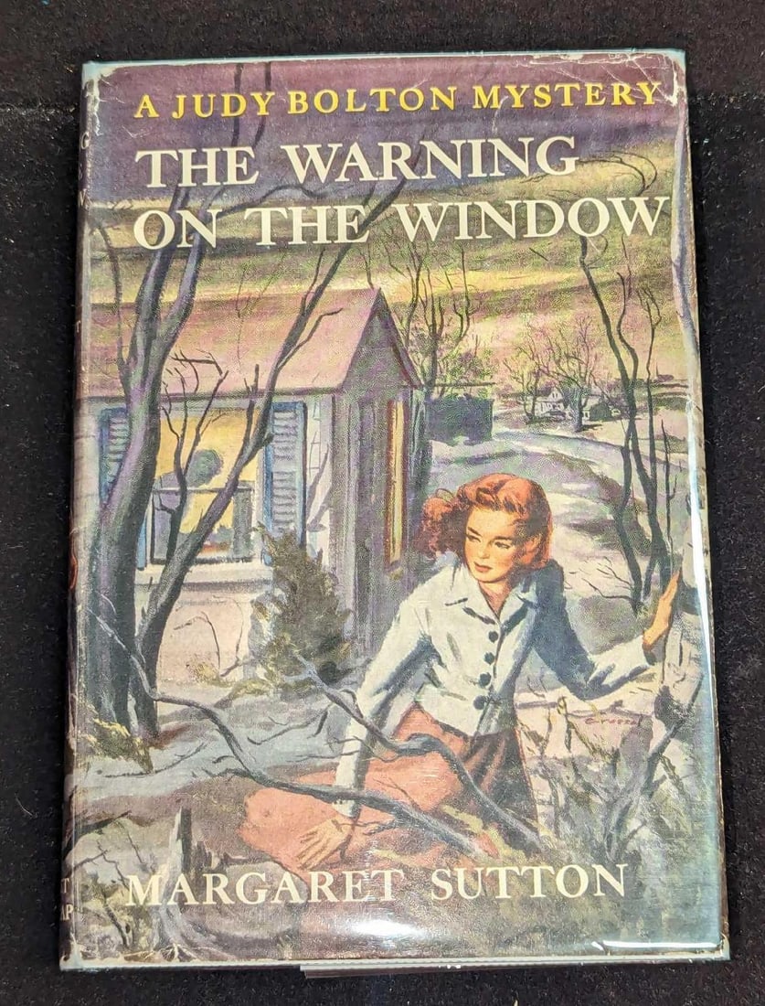 1st Ed Judy Bolton The Warning On The Window HC #20: 1st Ed Judy Bolton The Warning On The Window HC #20. "A Judy Bolton Mystery - The Warning On The Window". By Margaret Sutton (The pen name of Rachel Beebe) and was published by Grosset & Dunlap (New Y