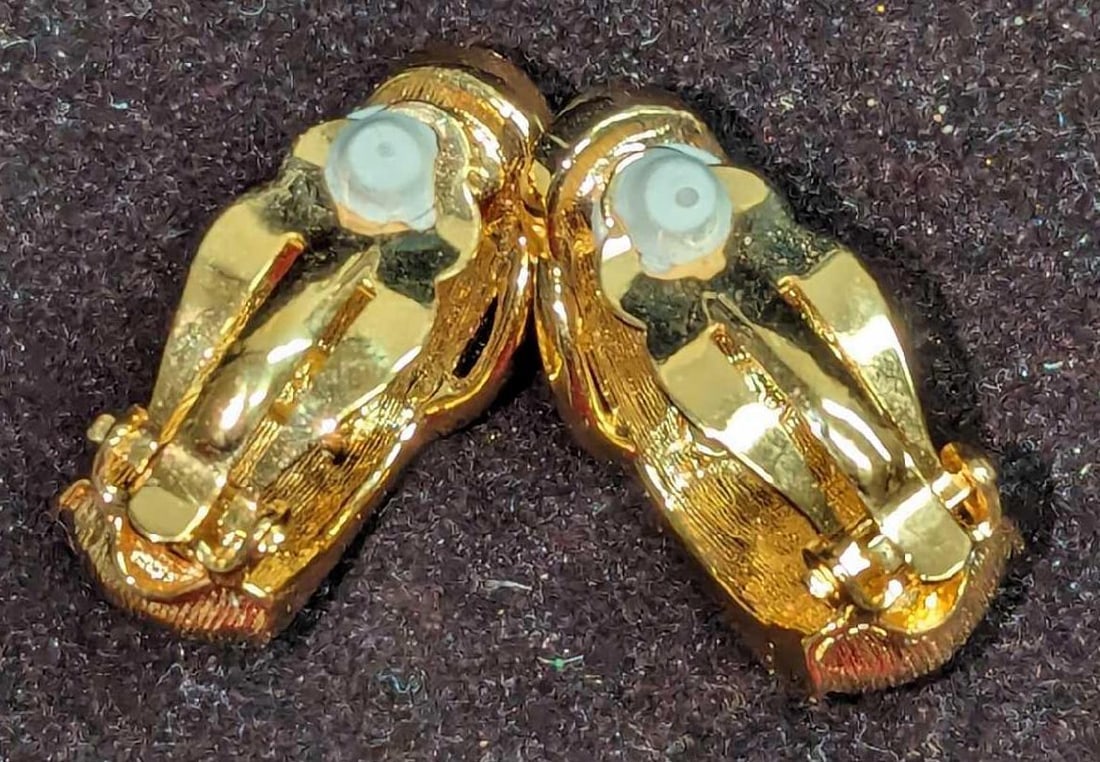 Joan Rivers Floral Rhinestone Gold Tone Earrings: Joan Rivers Floral Rhinestone Gold Tone Earrings. Each is approx 3/8" x 3/8" x 1". The earrings came in a bag that is approx 2" x 1/4" x 2 1/2" and it weighs 