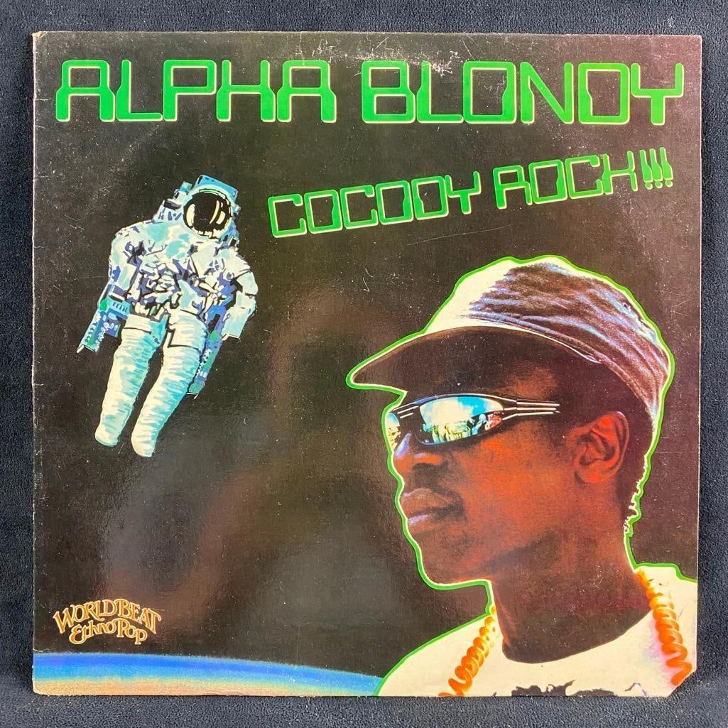 Alpha Blondy "Cocody Rock!!!" Vinyl: Alpha Blondy "Cocody Rock!!!" Vinyl Cocody Rock!!! by Alpha Blondy, the famous reggae artist. The cover and disc have normal wear, but any scratches appear light. This is a promotional