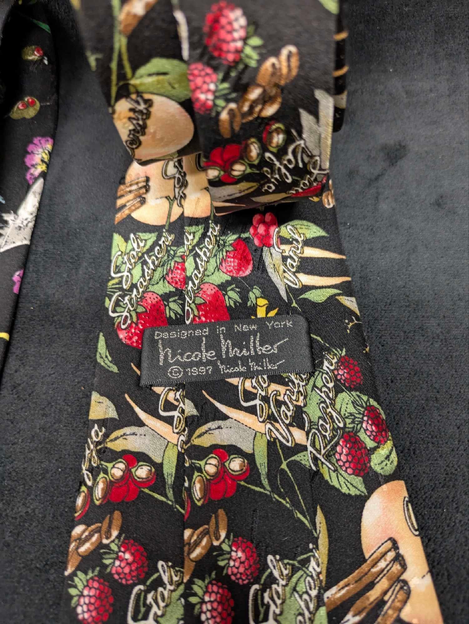 Nicole Miller Bombay Gin And Stoli Vodka Silk Ties: Nicole Miller Bombay Gin And Stoli Vodka Silk Ties. Each tie comes new in a clear plastic sleeve. Each, folded is approx 15" x 5" x 1/4" and it weighs 0.18lb. 