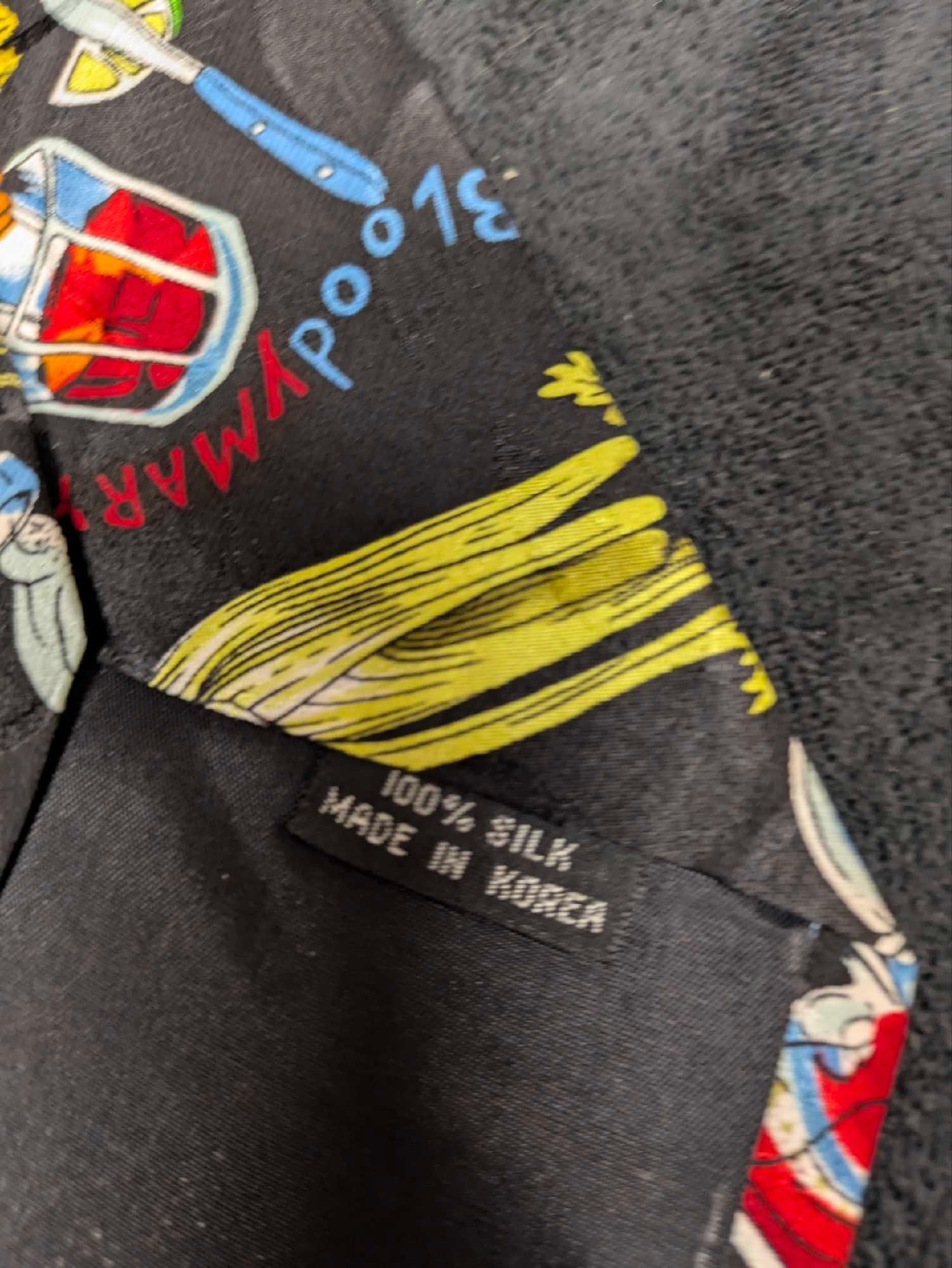 2 Nicole Miller Bloody Absolut Vodka Silk Ties: 2 Nicole Miller Bloody Absolut Vodka Silk Ties. Each tie comes new in a clear plastic sleeve. Each, folded is approx 15" x 5" x 1/4" and it weighs 0.18lb.