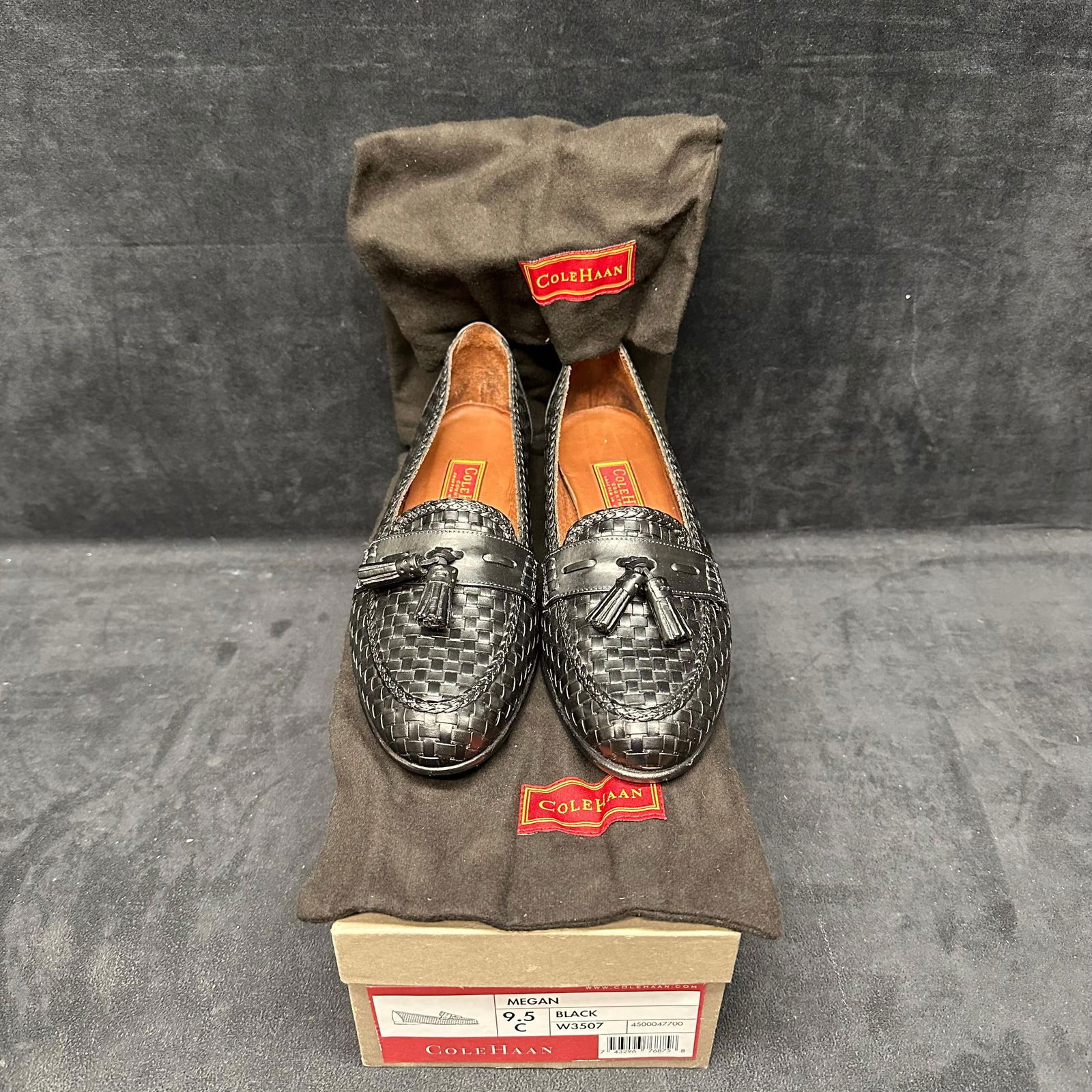 Cole Haan Megan Woven Loafer Black Leather Size 9.5 C Women’s Dress Shoes: Pair of Cole Haan Megan loafers crafted in woven black leather with signature tassel detail across the vamp. Made in Italy, these shoes feature soft leather lining, perforated insoles for comfort, and