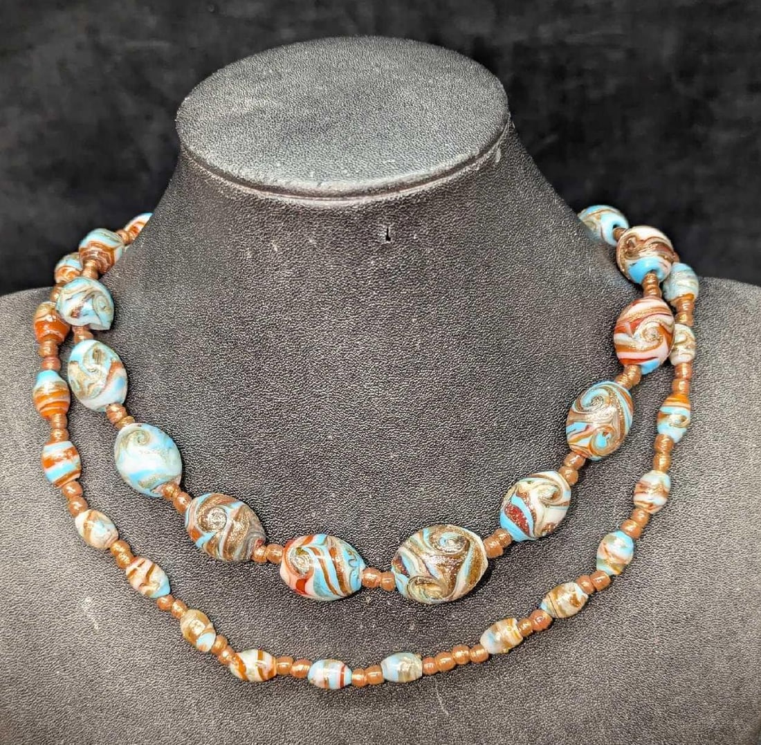 Vintage 38" Italian Murano Art Glass Bead Necklace: Vintage 38" Italian Murano Art Glass Bead Necklace. This is 38" and it weighs 0.27lb. One of the beads is broken off. Please see the images as they are part of the description.