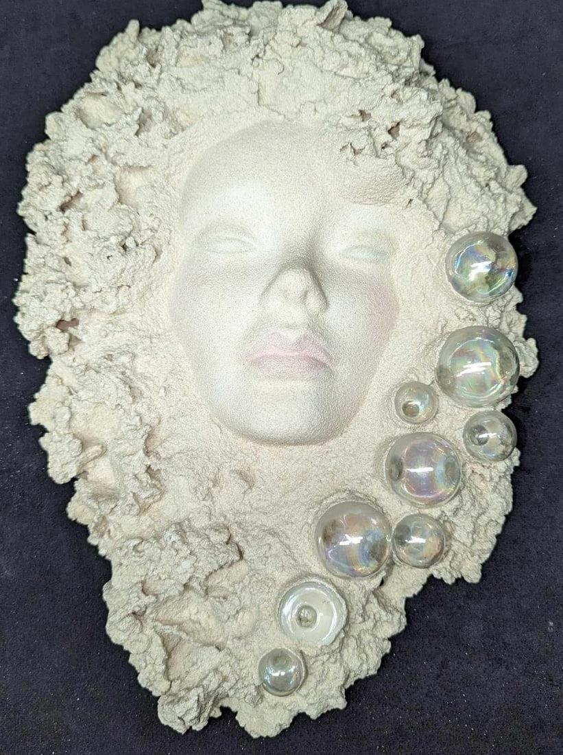 Vintage Woman Hard Sand Art Wall Sculpture: Vintage Woman Hard Sand Art Wall Sculpture. The maker and date of creation are unknown. This is approx 12" x 3 1/2" x 17" and it weighs 8.40 lbs. One of the "bubbles" is missing. This has a hook on th