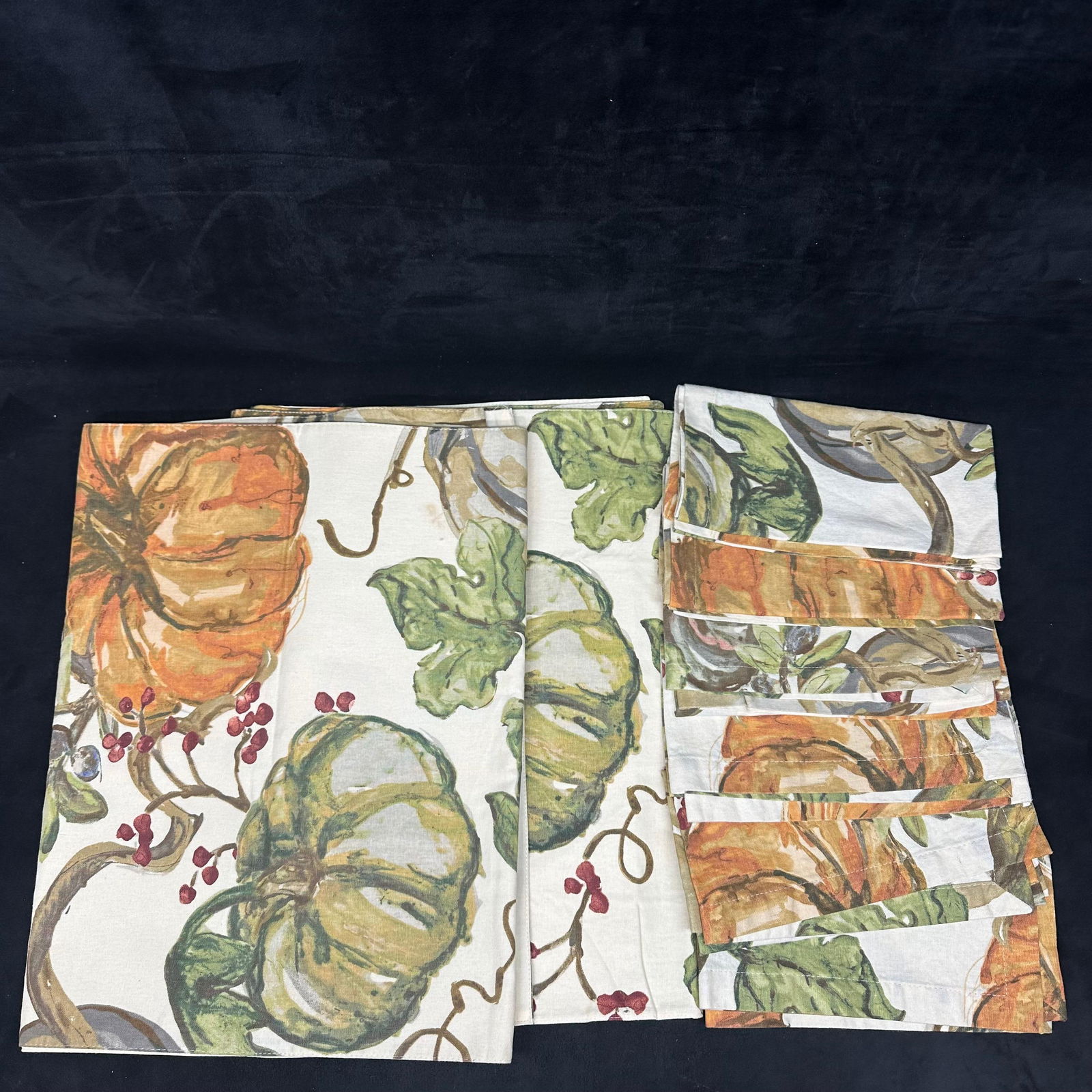 Pottery Barn Fall Harvest Placemats and Table Runners Pumpkin Pattern Set: The lot includes a coordinated Pottery Barn table linen set featuring a fall harvest pumpkin and foliage motif. Pattern shows pumpkins, vines, leaves, and berries in warm autumn tones. Fabric tags in