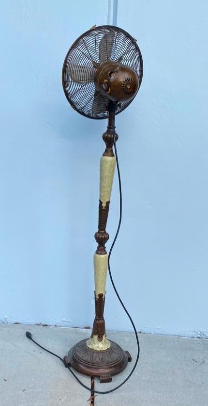 Decorative Edison Fan Replica: Decorative Edison Fan Replica This decorative fan made of metal and faux marble is an elegant decor item for any home. The fan was tested and it does not turn on. The "On" switch is missing.