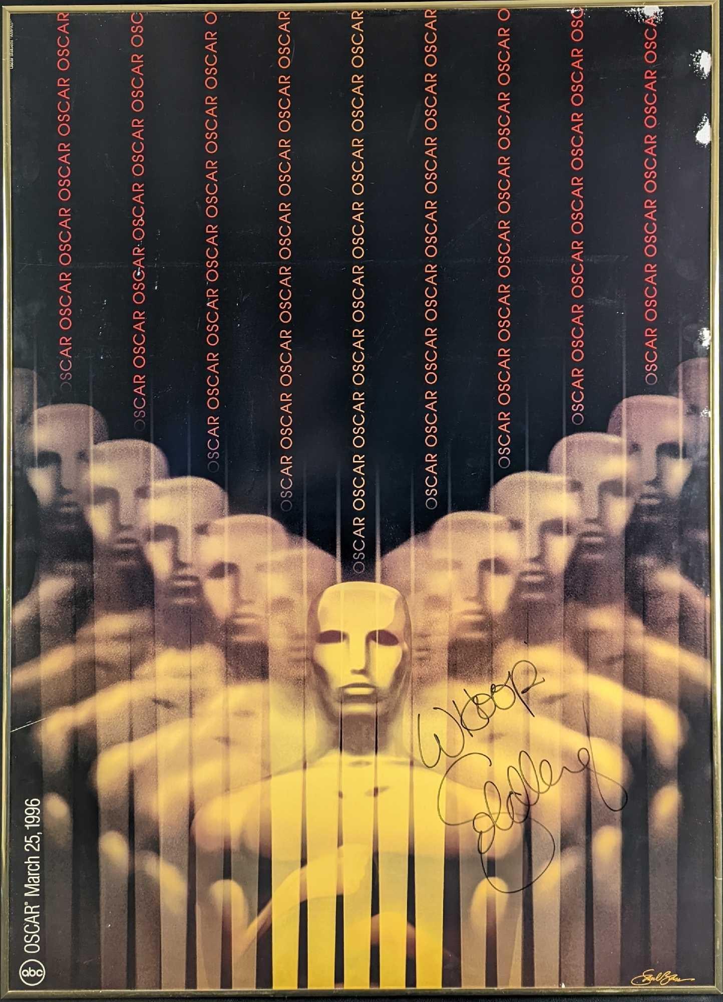 Autographed Whoopi Goldberg Oscars Poster: Autographed Whoopi Goldberg Oscars Poster. The framed poster is approx 26" x 1" x 36 1/2" and it weighs 2.5lbs. The poster is in a good, used condition with some rips. Please see the image