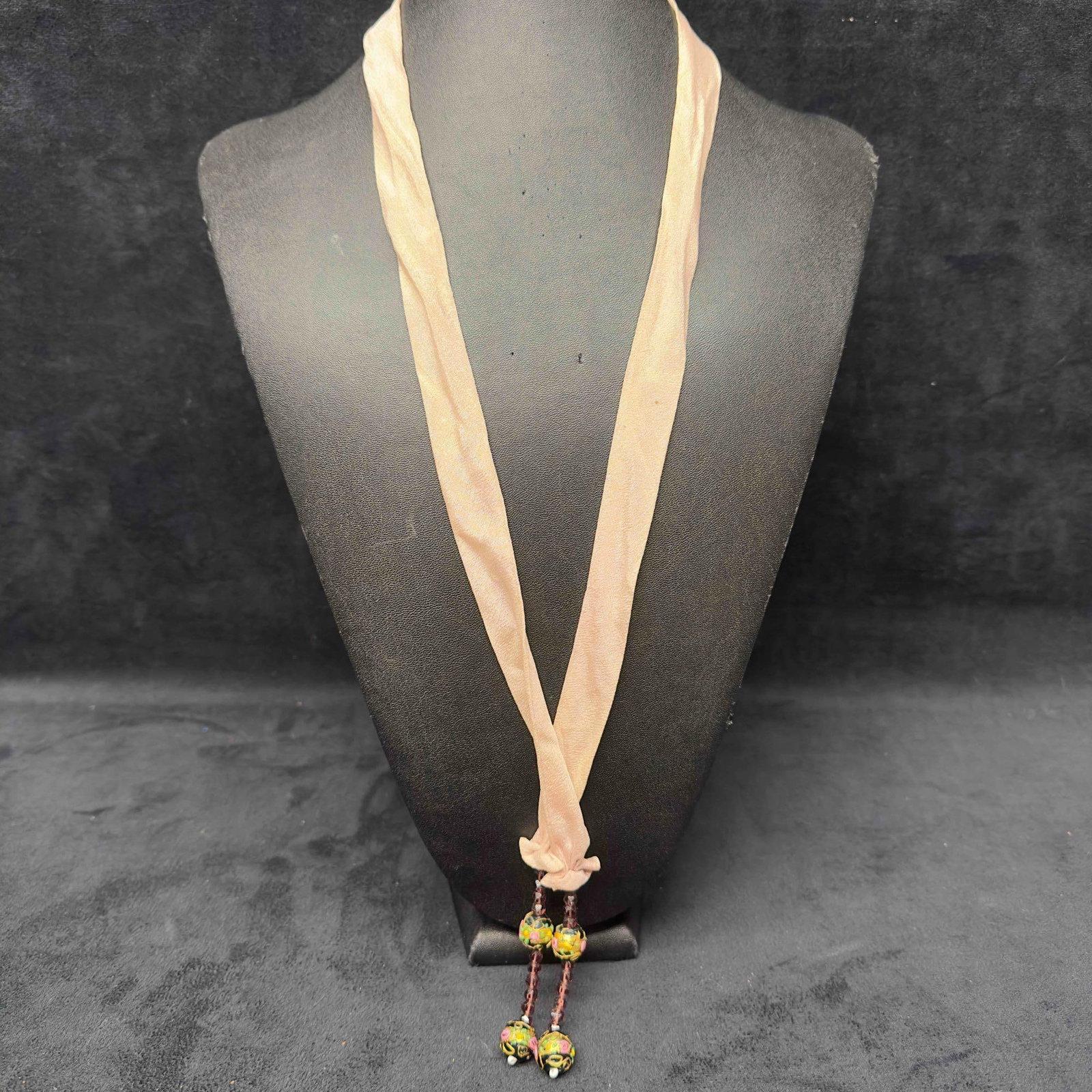 Murano Venetian Lamp Work Glass Bead Black Floral Flower Four Beaded Pink Ribbon Necklace: Murano Venetian Lamp Work Glass Bead Black Floral Flower Four Beaded Pink Ribbon Necklace. Necklace with black colored glass beads with beautiful designs on each. The necklace features multi colored a