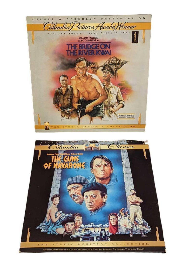 Guns Of Navarone & Bridge On The River Kwai Laser Discs: This lot includes: (1) The Bridge On The River Kwai Deluxe Two-Disc Widescreen Presentation.(1) The Guns Of Navarone Deluxe Two-Disc Widescreen Presentation. Each is approx 12 1/4" x 12 1/4"