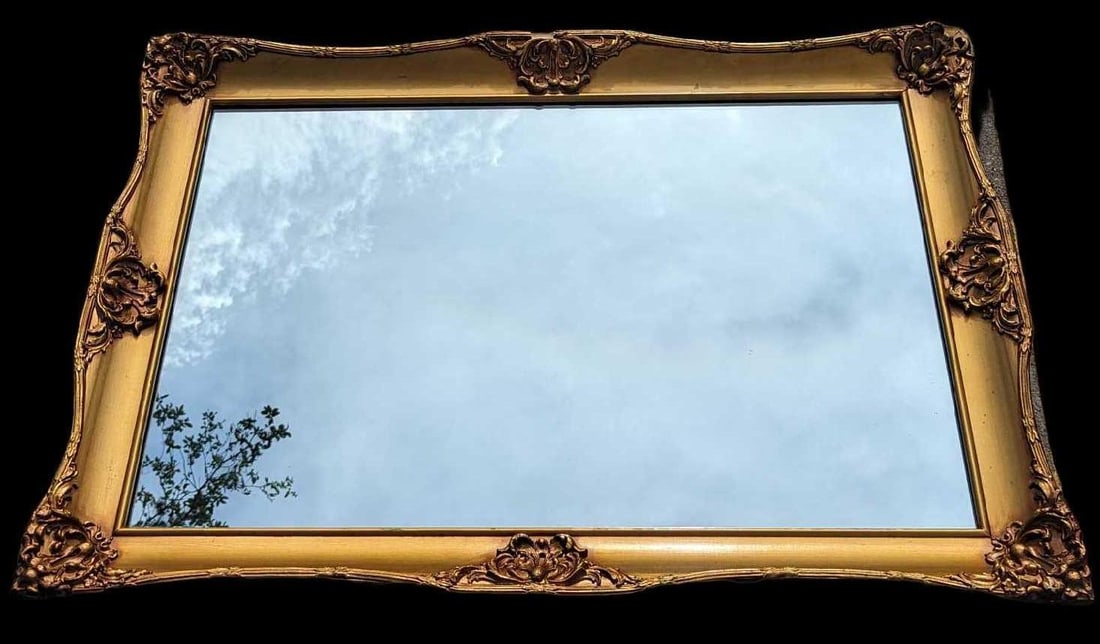 Vintage Bassett Mirror Company Gold Gilded Mirror: Vintage Bassett Mirror Company Gold Gilded Mirror. This is approx 42" x 3" x 30 1/2" and it weighs 32.0 lbs. The frame has chips and markings. The backing is also coming apart. Please see the images
