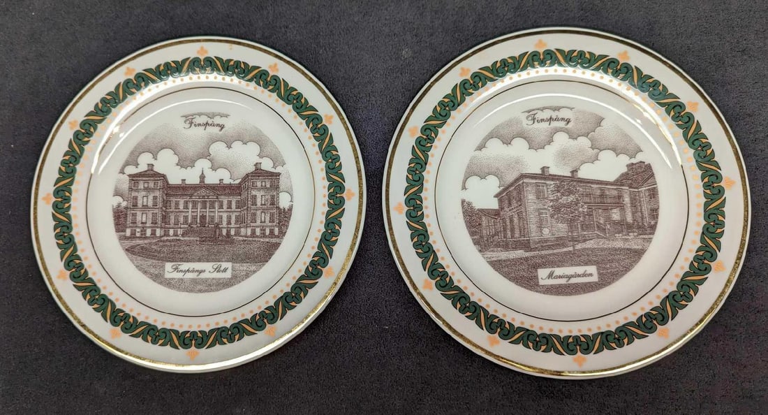 Finspang Sweden Mariagården & Finspångs Slott Plates: Finspang Sweden Mariagården & Finspångs Slott Plates. This lot shows two famous buildings in Finspang, Sweden. One plate shows the Mariagården and Finspångs Slott. Both plates were released i