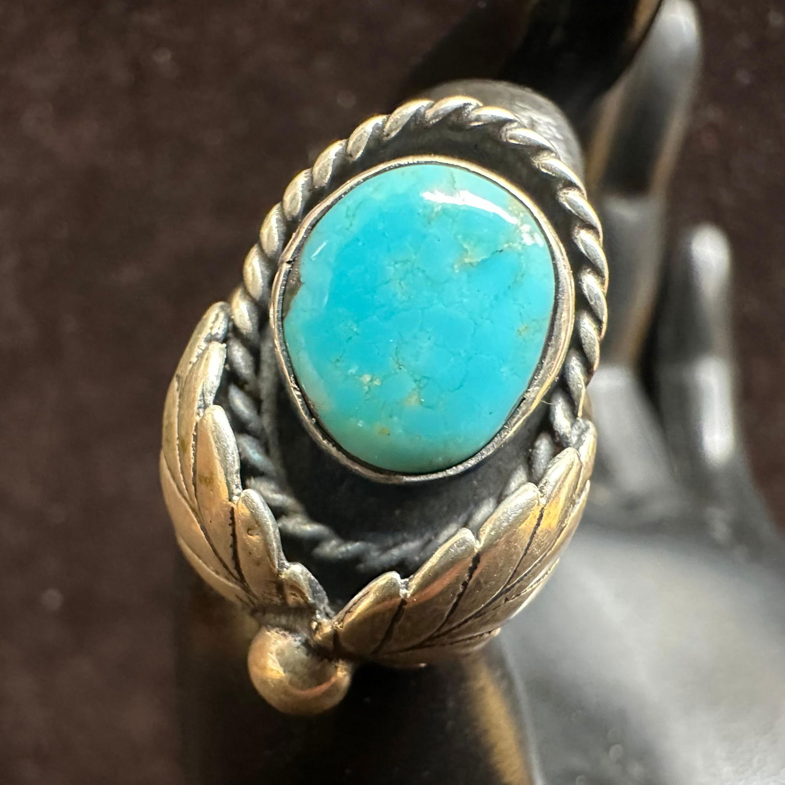 Faux Stone Turquoise Rope and Leaf Motif Accent Silver Ring: This item is in good pre-owned, previously used/displayed condition with noticeable light wear and surface scratches. Please reference all photos for full details. This piece of jewelry has been teste
