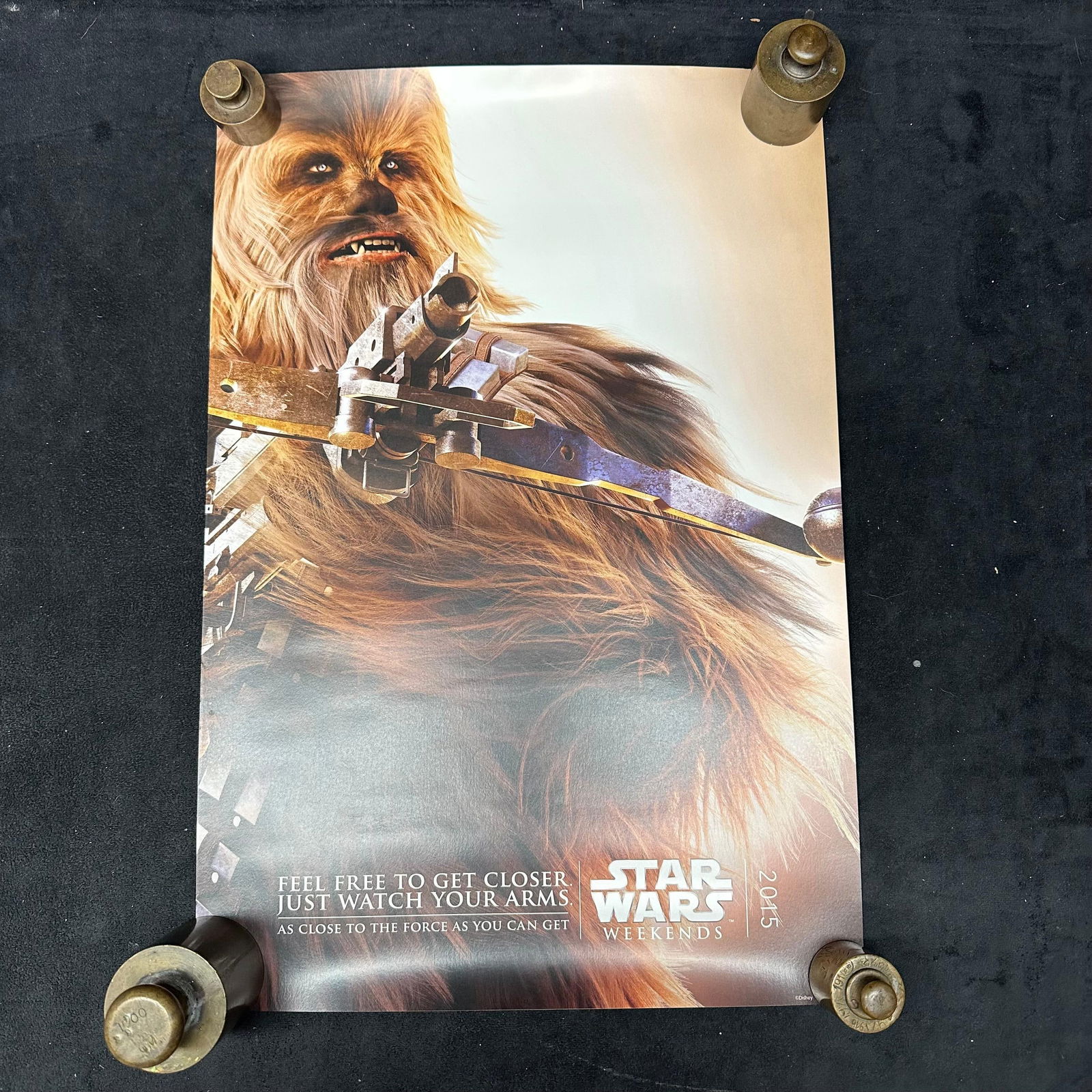 Star Wars Weekends 2015 Chewbacca Poster Print Disney: Original Disney Star Wars Weekends 2015 poster featuring Chewbacca. Marked Published and Distributed by Disney Star Wars. The poster is loose and unframed. Light surface wear and minor edge waviness