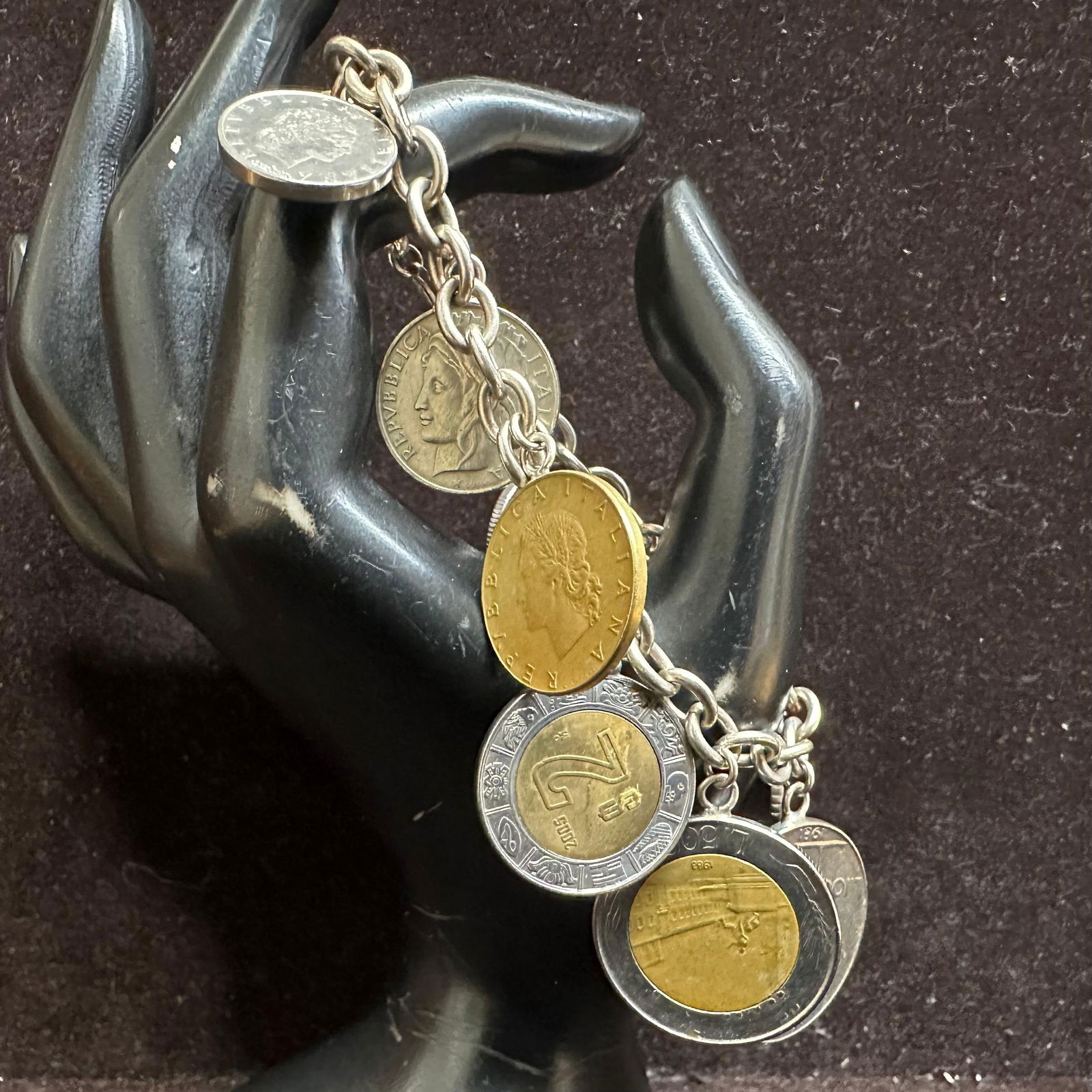 Milor Italy 925 Sterling Silver Italian Lire Coin Charm Bracelet P51: This item is in good pre-owned, previously used/displayed condition with noticeable light wear and surface scratches. Please reference all photos for full details. This piece of jewelry has been teste
