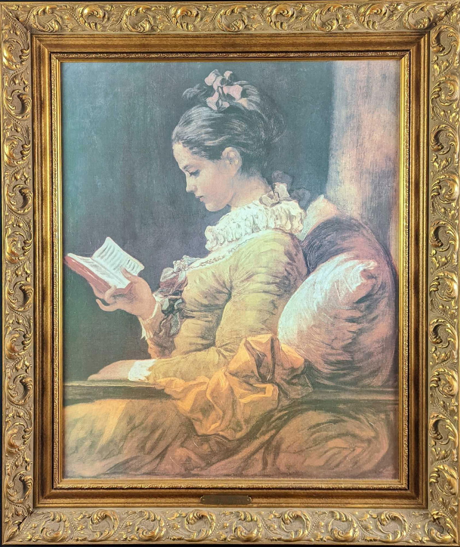 JB Jean-Honoré Fragonard Young Girl Reading Embellished Print: Framed Jean-Honoré Fragonard's "Young Girl Reading" Embellished Print. This framed print is approx 26" x 2" x 31" and it weighs 9lbs. The canvas is approx 20 1/2" x 25". The framed print is in a good