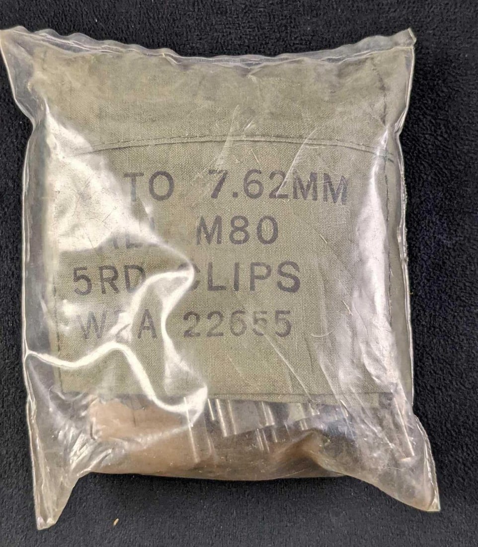 Sealed NATO 7.62 MM Ball M80 5 RD Clip Pouches: Sealed NATO 7.62 MM Ball M80 5 RD Clip Pouches. Comes with stripper clips. Is approx 5" x 1 1/4" x 5 1/2" and it weighs under one pound at 0.42lb. 