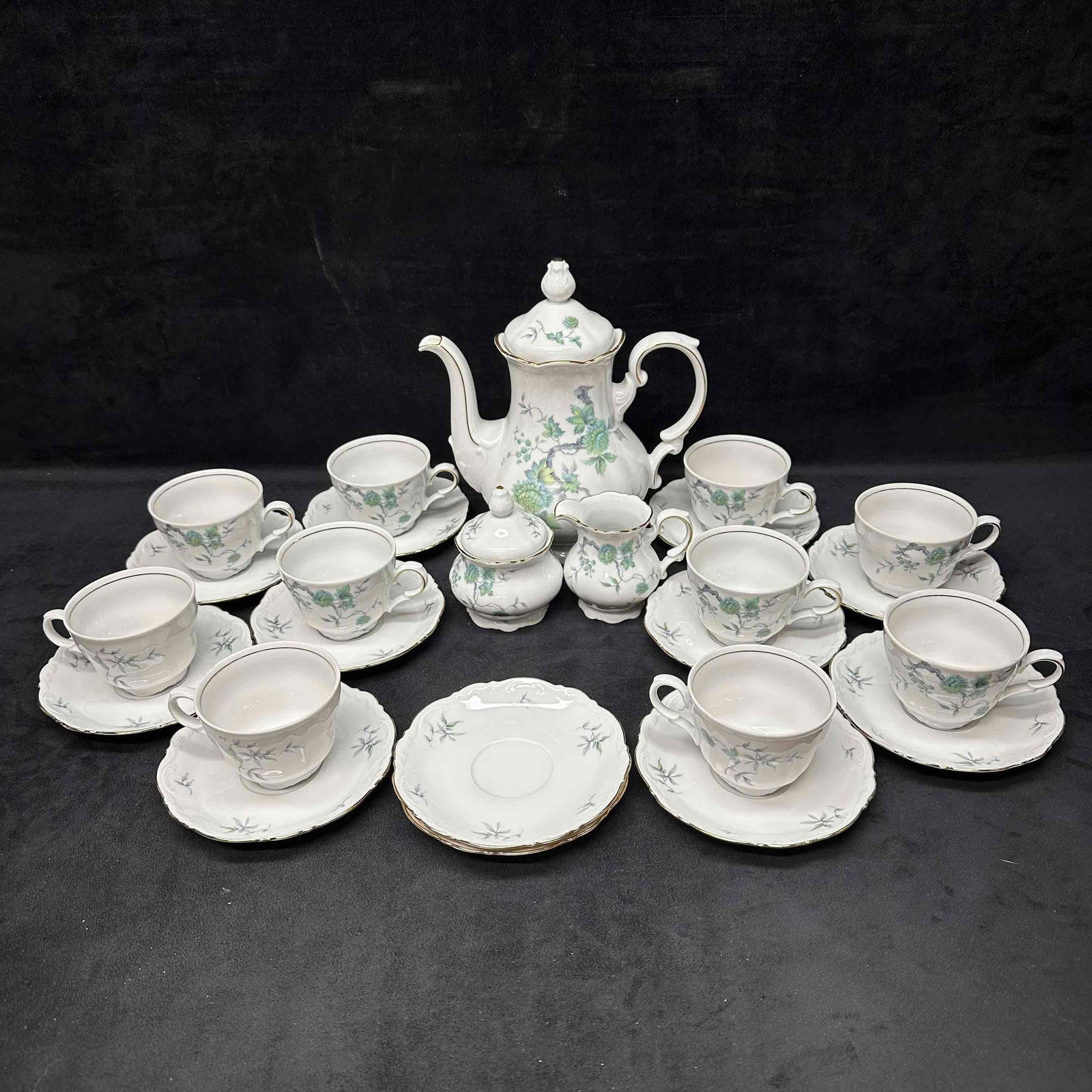 Green Ming Mitterteich Bavaria Germany Tea Set Pot Creamer and Sugar: Light wear noticed along the bottom of each piece, no chips, cracks, or breaks in the porcelain. These items are in good pre-owned, previously displayed condition with light wear and surface scratches