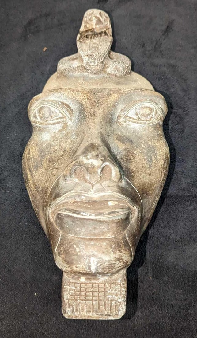 Vintage Egyptian Style Resin Figurine: Vintage Egyptian Style Resin Figurine. Its maker and date of creation. This is approximately 5 1/2" x 4 1/2" x 12" and it weighs 2.79lb. There appears to be some repair work on the snake. This has som