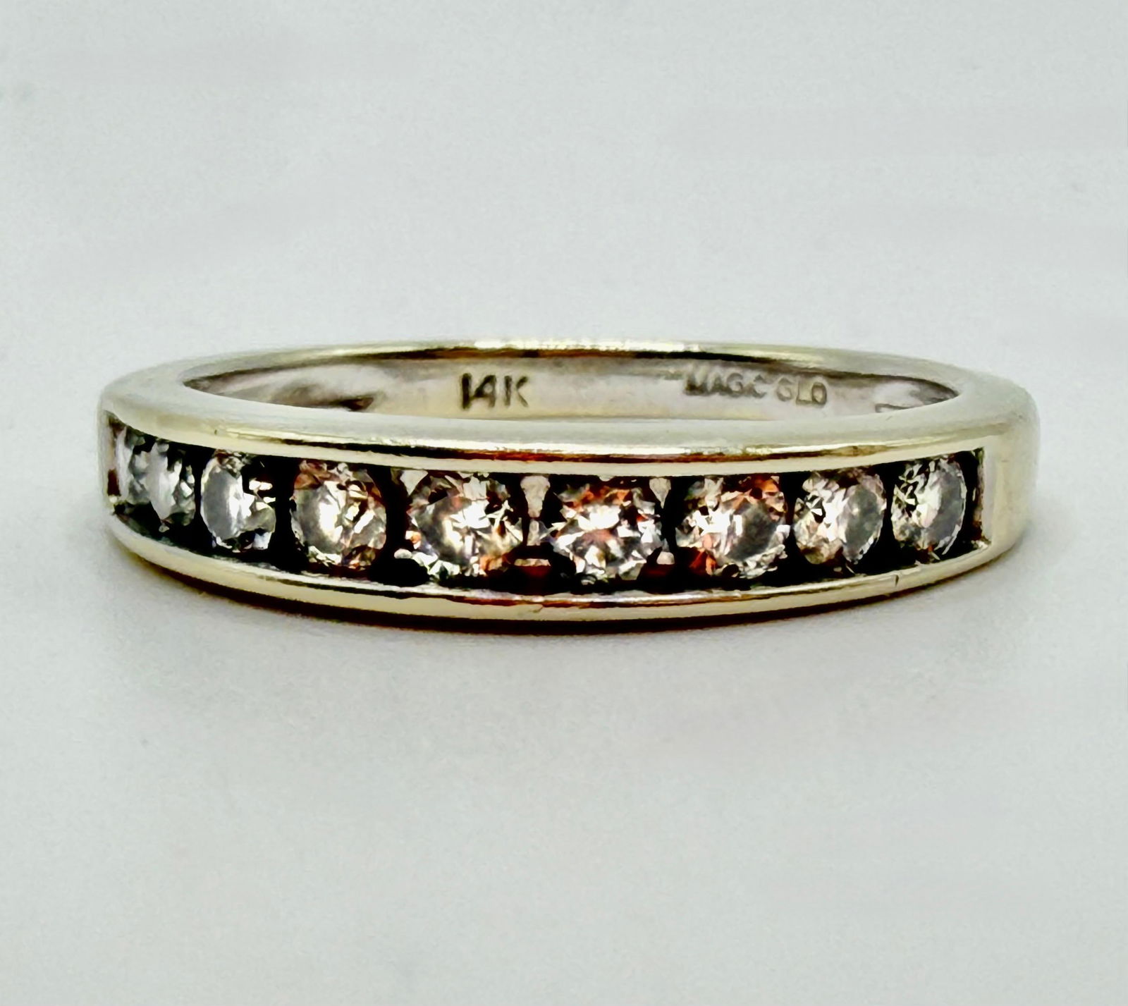 14K White Gold Diamond Wedding Anniversary Band Ring Magic Glo Nine Diamonds: This item is in good pre-owned, previously used/displayed condition with noticeable light wear and surface scratches. Please reference all photos for full details. This piece of jewelry has been teste