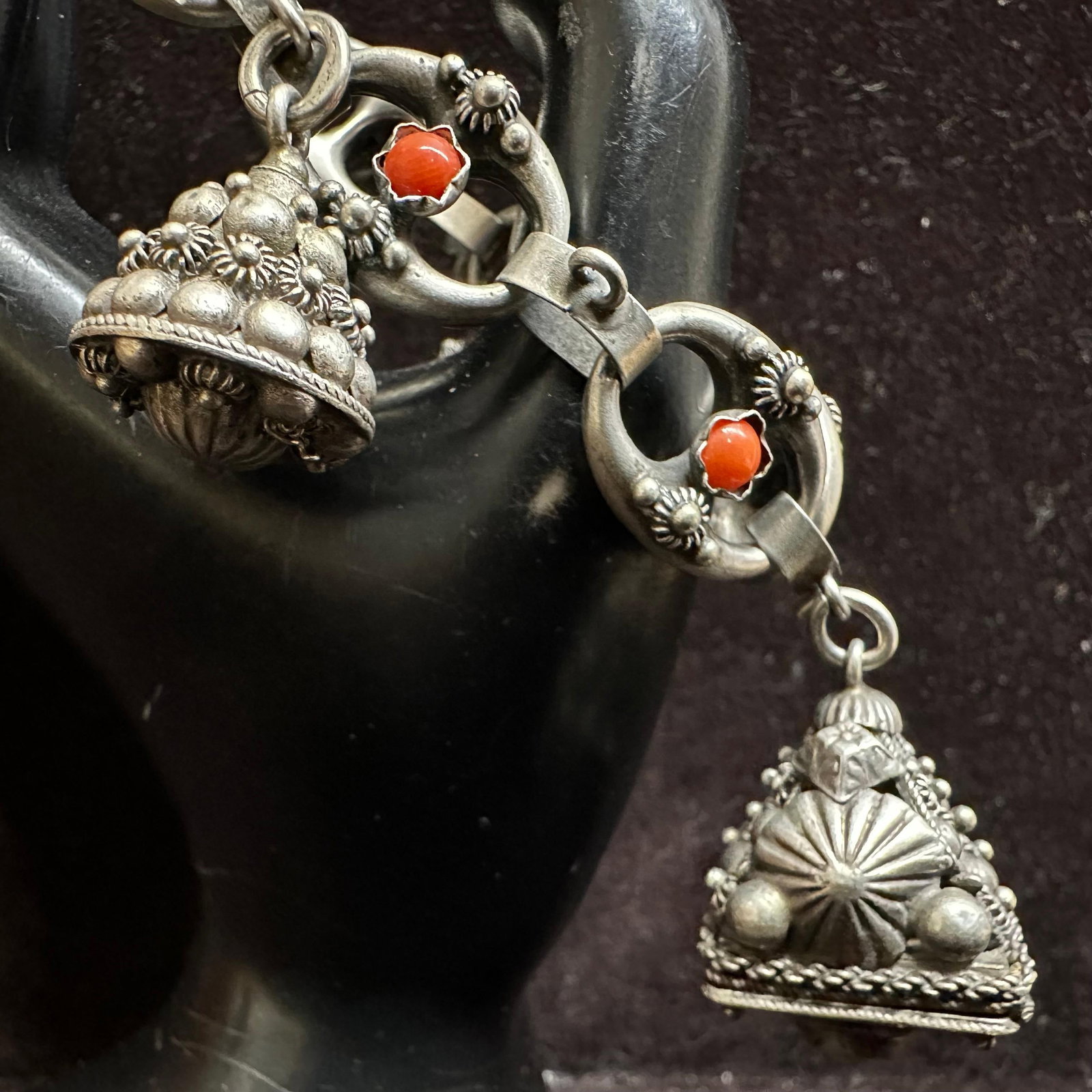 Etruscan Revival Style 835 Silver Charm Bracelet Coral Ornate Charms: This item is in good pre-owned, previously used/displayed condition with noticeable light wear and surface scratches. Please reference all photos for full details. This piece of jewelry has been teste