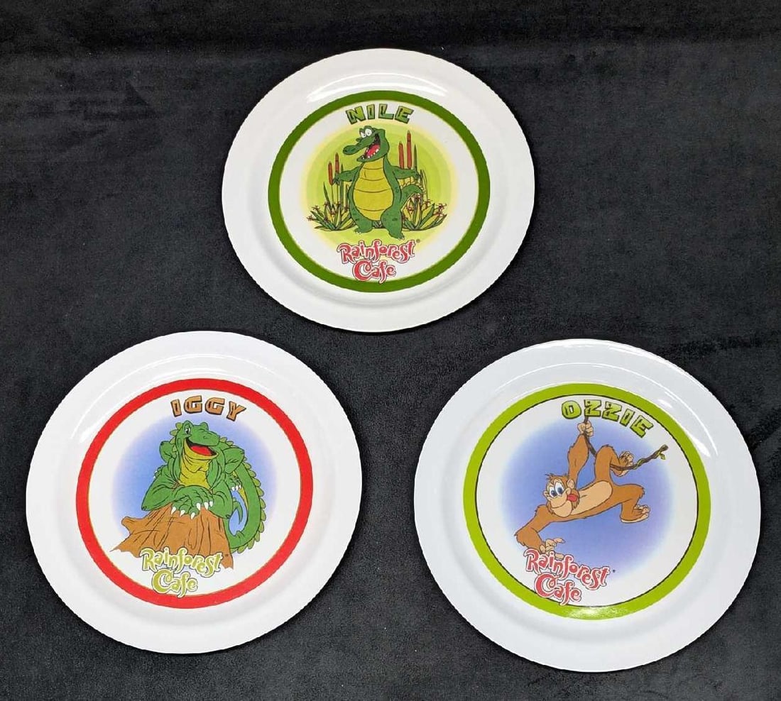 3 Rainforest Cafe Character Dinner Plates: 3 Rainforest Cafe Character Dinner Plates. Each of these plates are made of a hard plastic and were released in the year 2002. These are not meant for the microwave and can be used in a dishwasher, as