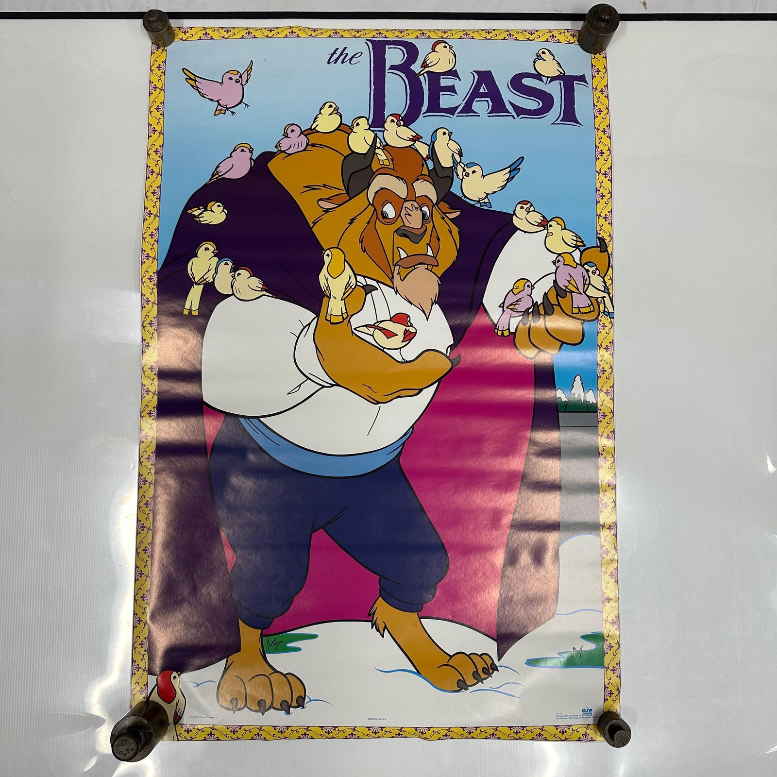 The Beast Walt Disney Beauty and the Beast Character Poster: Original Walt Disney character poster featuring The Beast from Beauty and the Beast, depicted with a decorative border and bird motif. A scene from the film. Poster shows visible edge wear, light crea