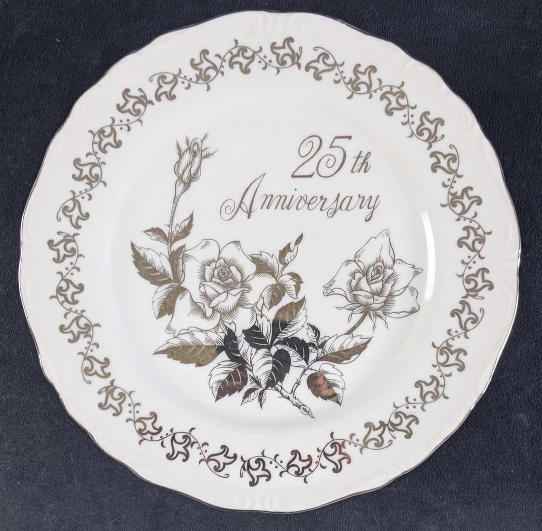 Royal Crown 25th Wedding Anniversary Raised Plate: This platters full name is the Royal Crown Silver 25th Wedding Anniversary Collector Plate. This plate is a raised platter for hor d'oeuvres or cake. The platter is in great condition with the wri
