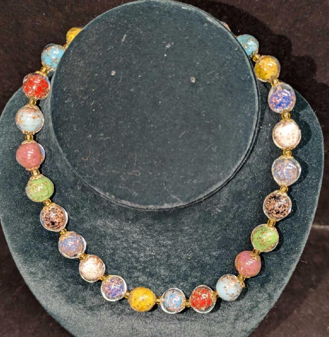 Vintage Italian Murano Colorful Art Glass Bead Necklace WWW: Vintage Italian Murano White And Gold Art Glass Bead Necklace WWW. Glass beads with hand painted designs. Is approx 15" and it weighs 0.12lb.