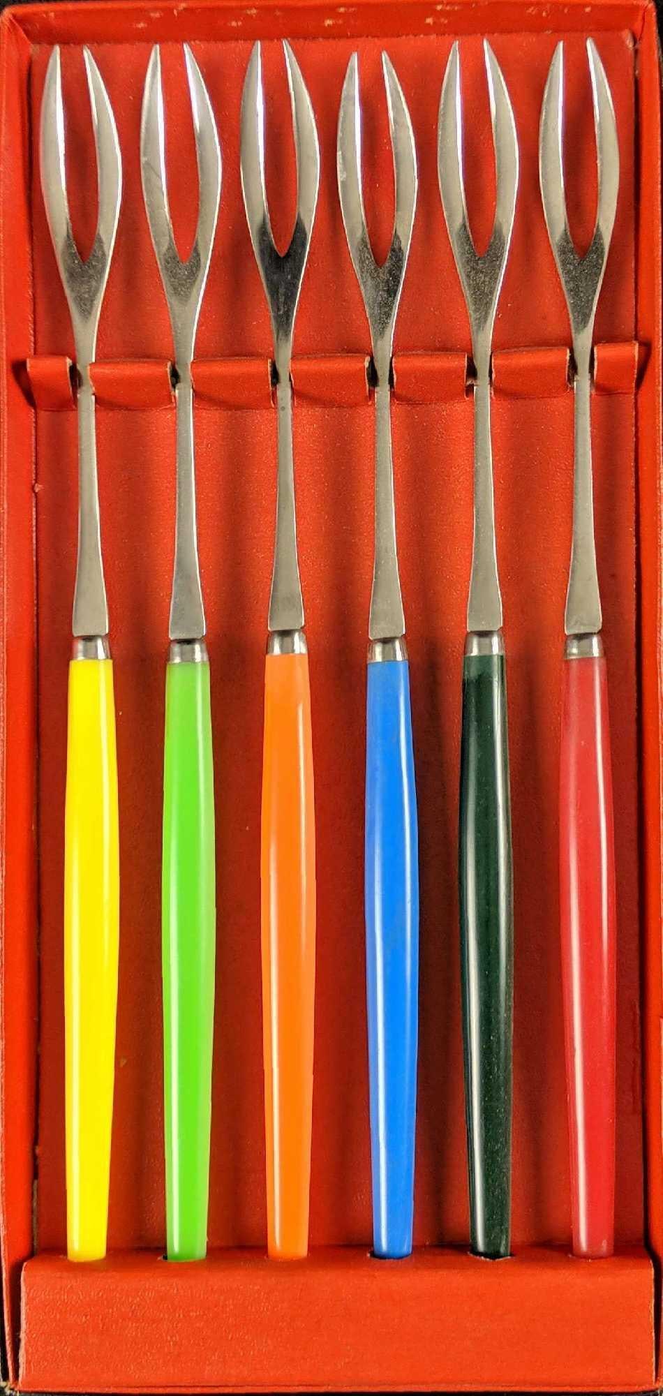 Appetizer Bistro Cocktail Two Prong Steel Fork A: Here is a set of colorful bistro forks. Each fork has a different colored handle made of a very sturdy acrylic while the rest is made of stainless steel. Comes in its original box which is approx 5"