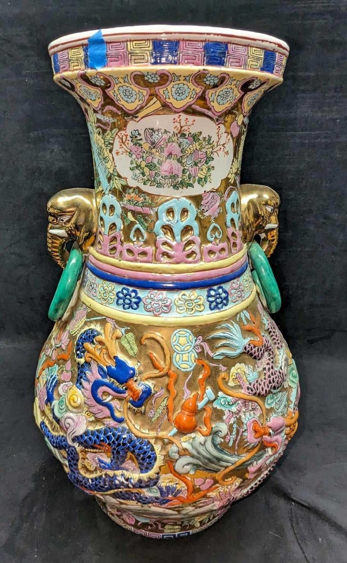 Chinoiserie Dragon Vase With Elephant Handles: Chinoiserie Dragon Vase With Elephant Handles. The vintage vase was hand-painted. Made In The Philippines. The stand is approx 14" x 14" x 5" the vase is approx 14" x 14" x 23" and the total