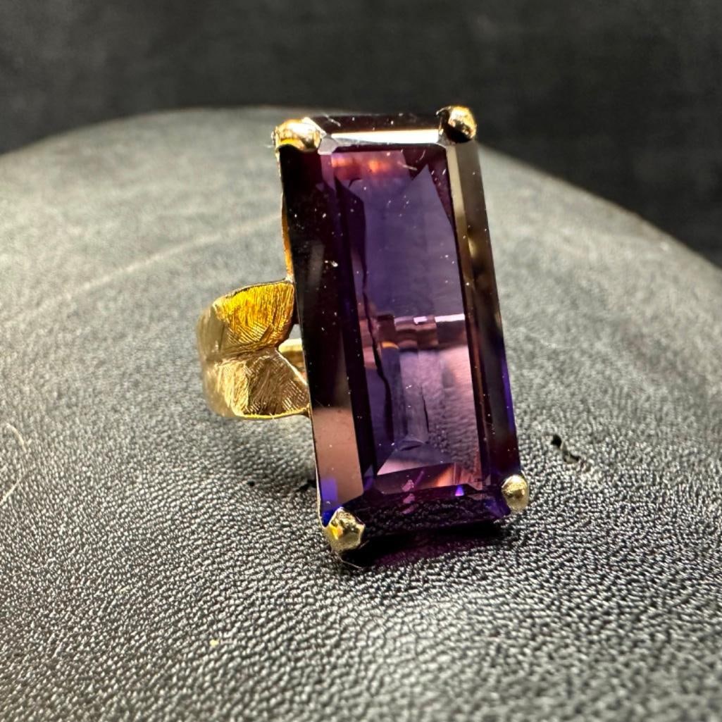 Vintage 10k Ring with Large Color-Change Stone: This piece of jewelry has been tested and researched prior to listing. Please view all our pictures they are part of our description. DETAILS: Metal - 10k Gold Color - Yellow Gold Stones - Unconfirme