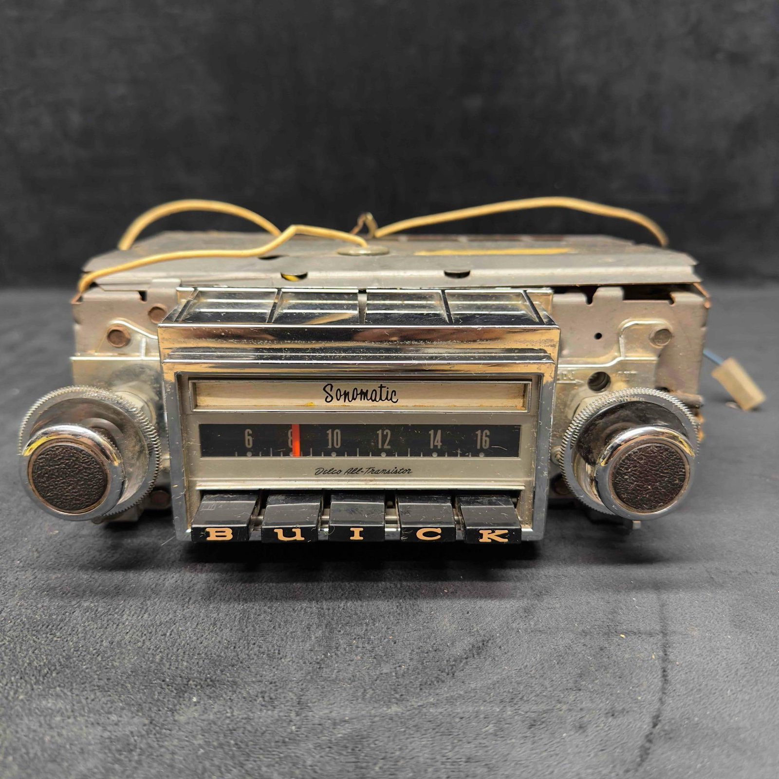 1970s Buick Sonomatic Radio 7306904 Vintage Chrome: Buick Sonomatic Car Radio with Letter Push Buttons Model 7302504 Untested. This radio was pulled from a working vehicle, displayed in a collectors car collection. Radio is untested and shows signs of
