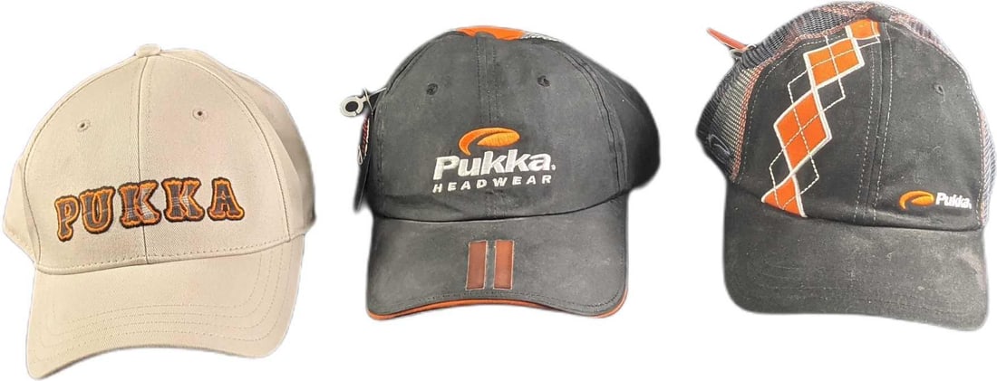 3 Pukka Adult Caps Hats Headware: This lot includes: (1) Orange, Black & White 100% Cotton Cap. This is approx 7" x 10" x5". (1) Orange, Black & White 100% Polyester Cap. This is approx 7" x 10" x5".