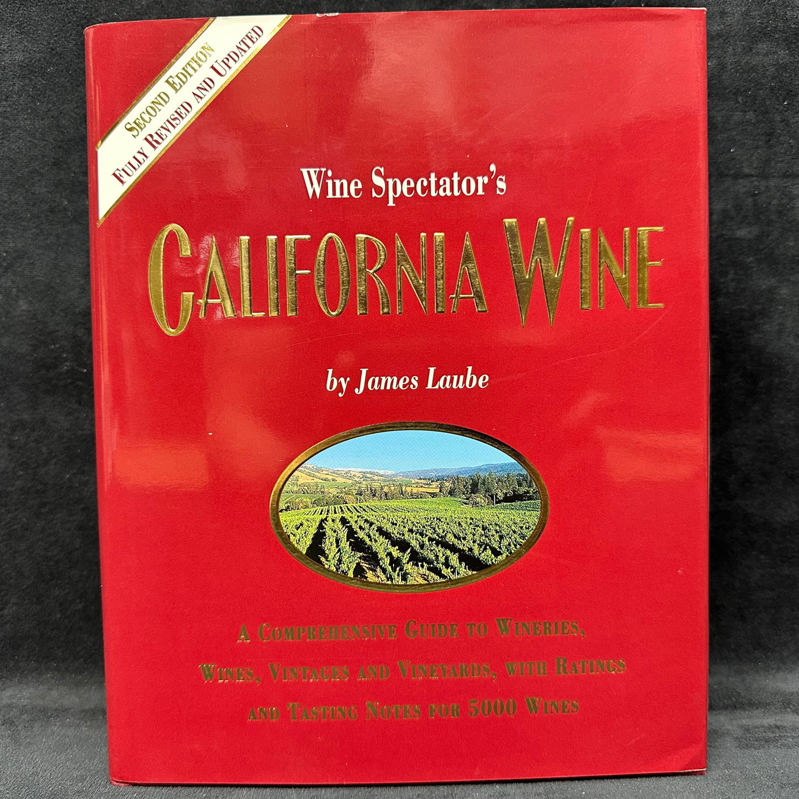 Signed Wine Spectator’s California Wine Marvin R. Shanken Dated 1999: Hardcover copy of Wine Spectator’s California Wine by James Laube, Second Edition, fully revised and updated. This comprehensive reference covers California wineries, wines, vintages, vineyards, rat