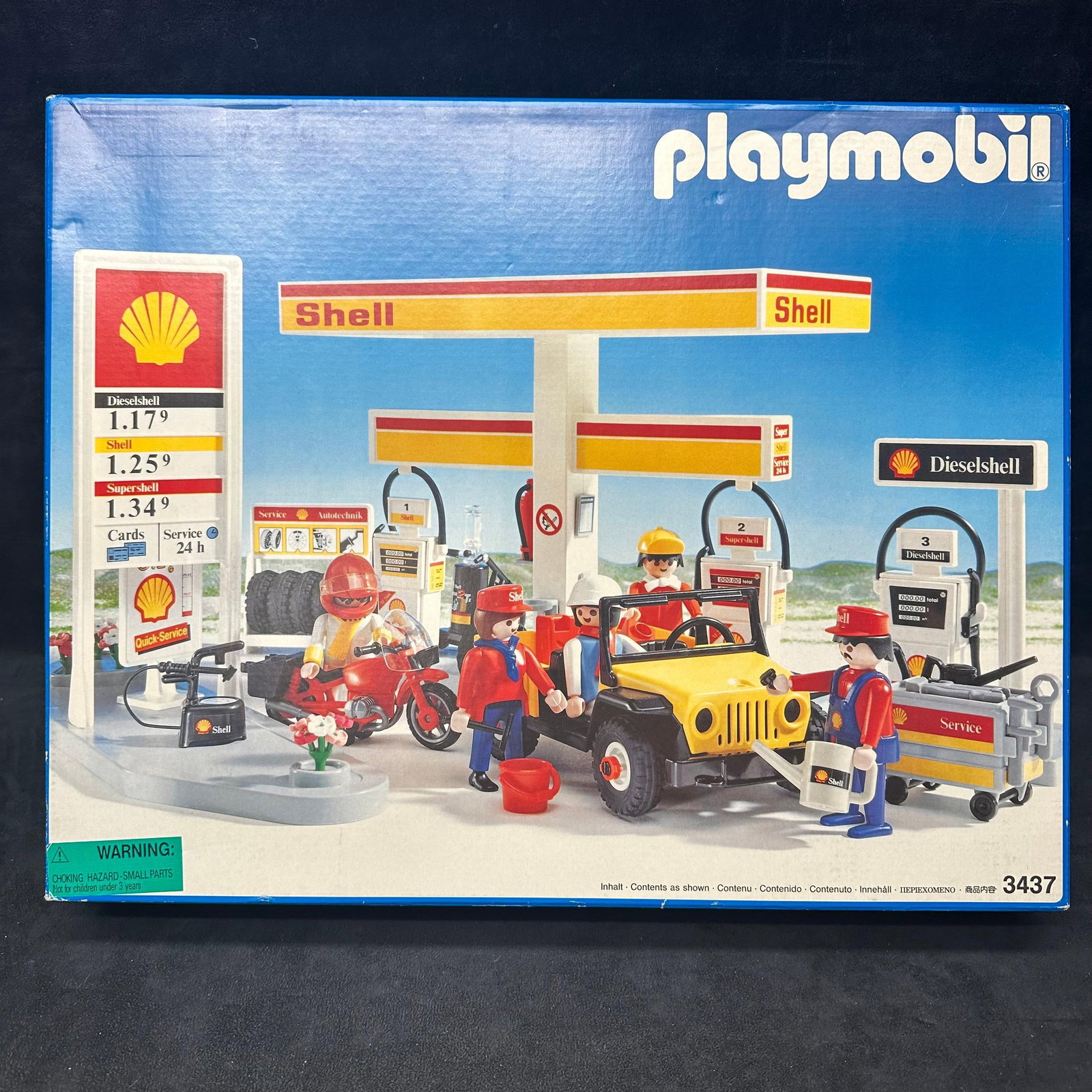 Playmobil Shell Gas Service Station Set No. 3437: Playmobil Shell Service Station Set No. 3437, including original box and contents. Interior components appear unused, with many parts still factory-bagged. Includes decals sheet, accessories, vehicle