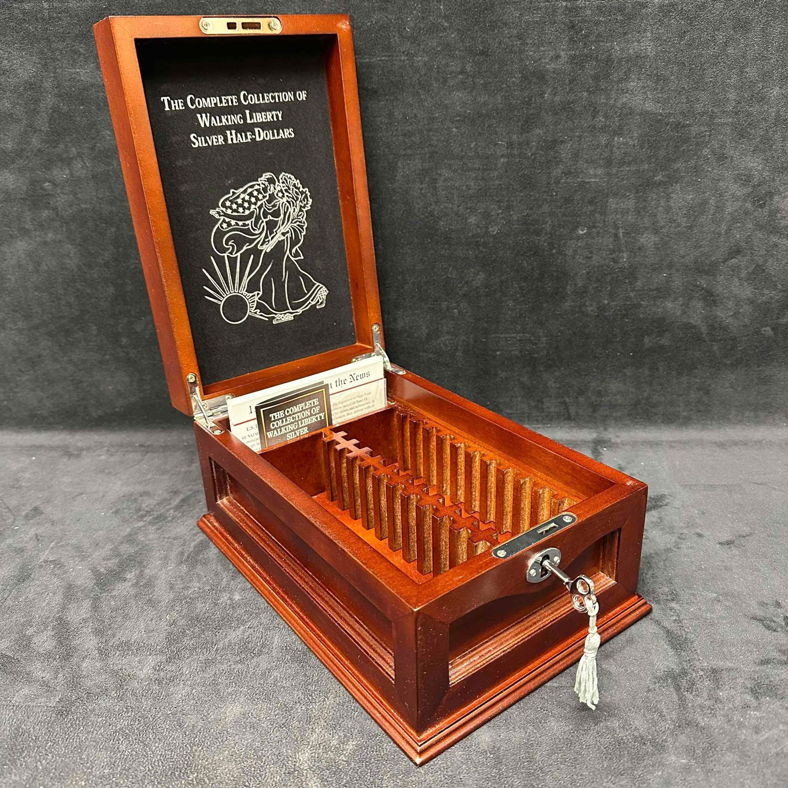 PCS The Complete Collection of Walking Liberty Half-Dollars Wooden Box with Key: This wooden box includes original paperwork and key. Turn key full functional. This item is in good pre-owned, previously displayed condition with light wear, and surface scratches. Please reference a