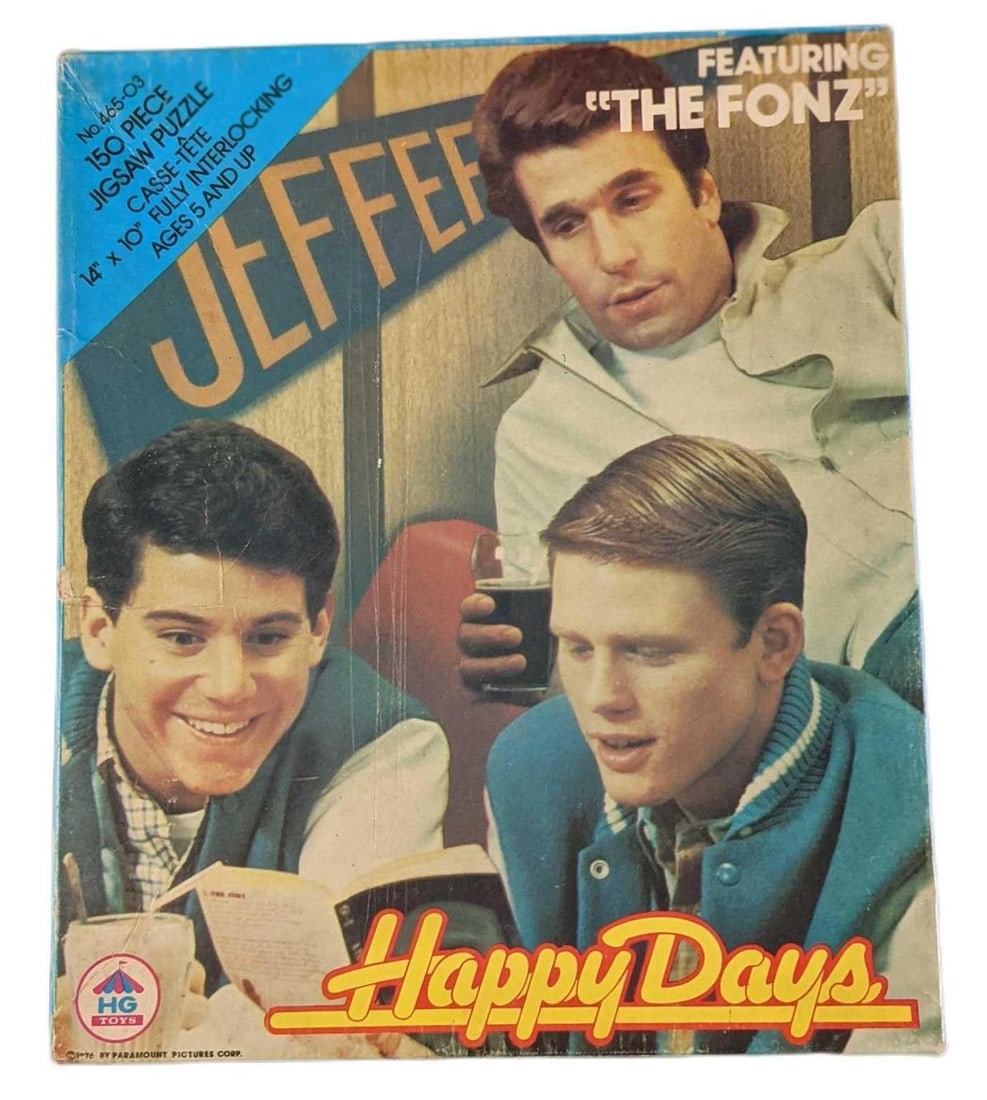 Vintage Happy Days & The Fonz 150 Piece Puzzle: Happy Days & The Fonz 150 Piece Puzzle Set By HG Toys. Was released in 1976. The box is approx 7 1/2" x 1 1/2" x 9" and it weighs under one pound at 0.36lb. All 150 pieces are inside the box.