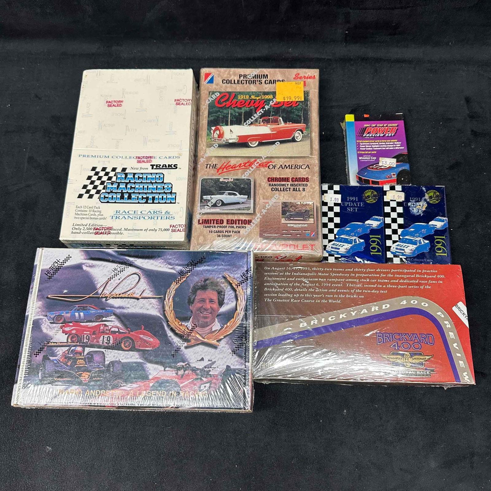 NASCAR Sealed Box Trading Cards Seven Boxes Set Collectors Card: NASCAR Sealed Box Trading Cards Seven Boxes Set Collectors Card. This set includes (2) Maxx Race Cards 1991 packs, (1) Power preview set, Brickyard 400 Box 24 packs, Mario Andretti box set, Racing Mac