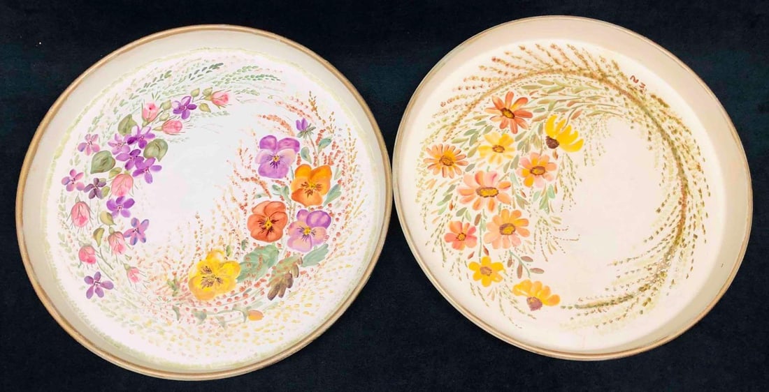 Two Hand Painted Flower Tin Dishes Signed SN: This lot contains Two Hand Painted Flower Tin Dishes Signed SN. Each dish is approx 12" x 12" x 1 1/4" and together they weigh about 1.3lbs. Overall the tin dishes are in good used condition with