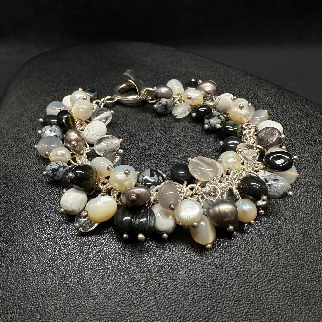 Sterling Silver Black, White, & Grey Stone Bead Bracelet: This piece of jewelry has been tested and researched prior to listing. Please view all our pictures they are part of our description. DETAILS: Metal - Sterling Silver Color - Silver Stones - various