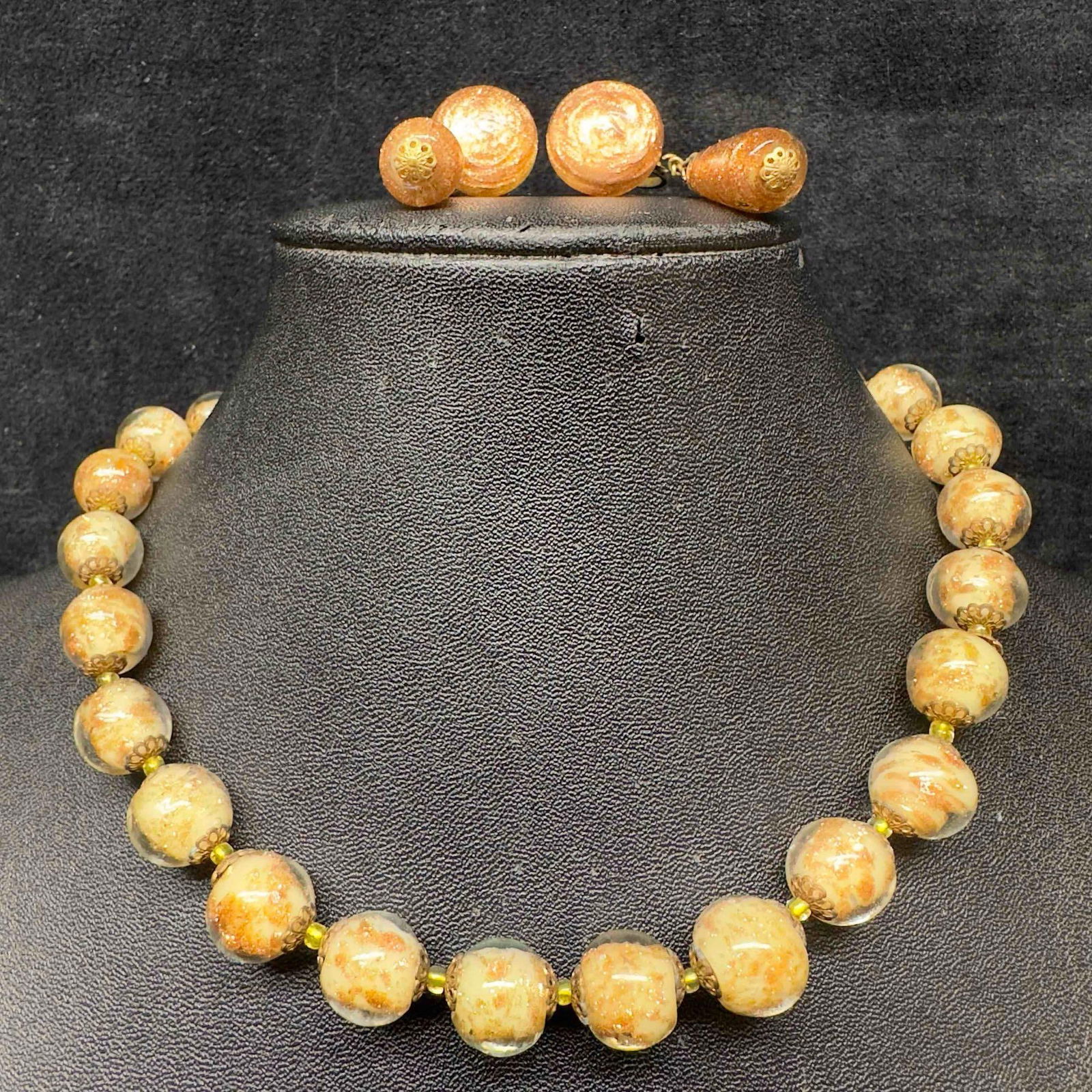 Murano Venetian Art Glass Lamp Work Creme Round Copper Infused Beaded Necklace and Earrings Set C28: Murano Venetian Art Glass Lamp Work Creme Round Copper Infused Beaded Necklace and Earrings Set C28. Necklace and earrings with creme and copper colored glass beads with beautiful designs on each. The