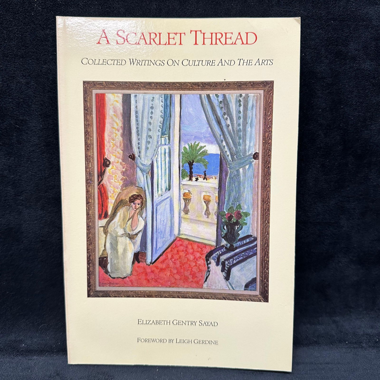 Softcover Book A Scarlet Thread Signed Personal Inscription by Elizabeth Gentry Sayad 1991: Signed and dated Elizabeth Gentry Sayad by with a personal inscription to Michel Roux, also includes a personalized note/letter. Condition shows general handling wear, scuffing, and surface marks to
