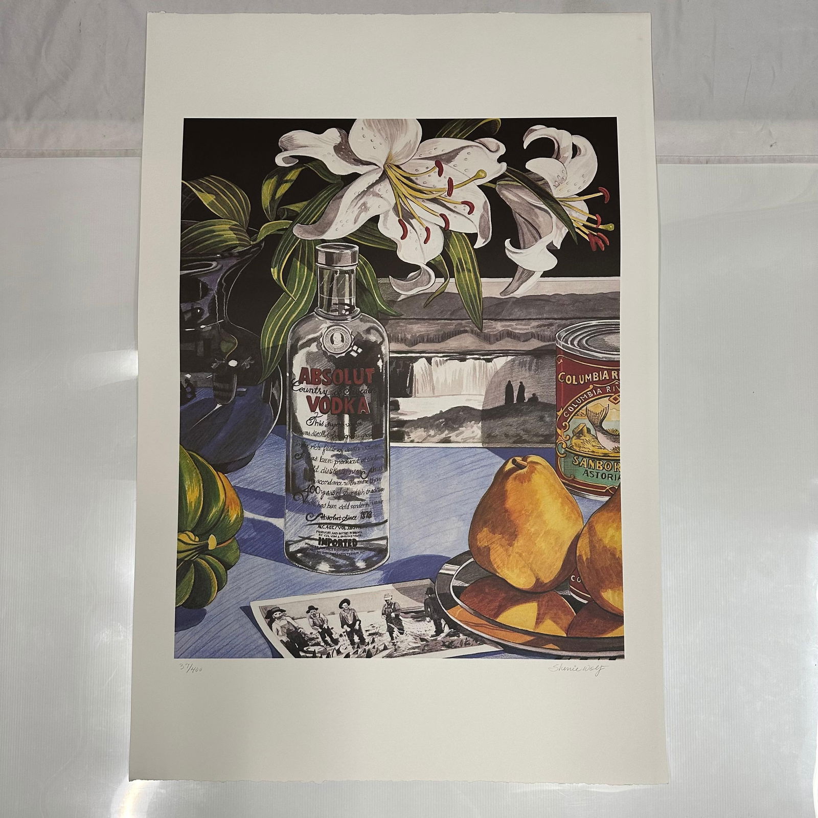 Signed and Numbered Absolut Vodka Statehood Oregon Sherrie Wolf Print 37/400: Limited edition Absolut Vodka “Statehood” lithograph print on paper. Features the iconic Absolut bottle incorporated into a stylized Oregon-themed landscape composition. Hand-signed by the