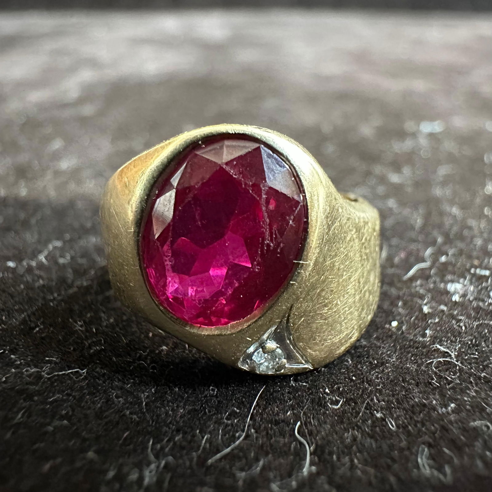 Lab Created Red Ruby and Moissanite 14K Yellow Gold Ring: This item is in good pre-owned, previously used/displayed condition with noticeable light wear and surface scratches. Please reference all photos for full details. This piece of jewelry has been teste